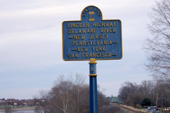 A sign my the Calhoun Street bridge survives from the "Lincoln Highway", a coast to coast road which pre-dates the US highway system