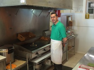 Abass, the older brother, does the cooking in Gyro Expresses tiny but immaculately clean kitchen