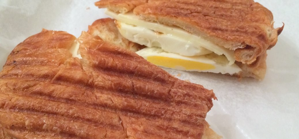 Egg and cheese on croissant